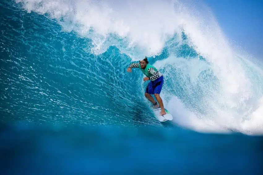 Mexican surf Alan Cleland gets barreled surfing an overhead wave