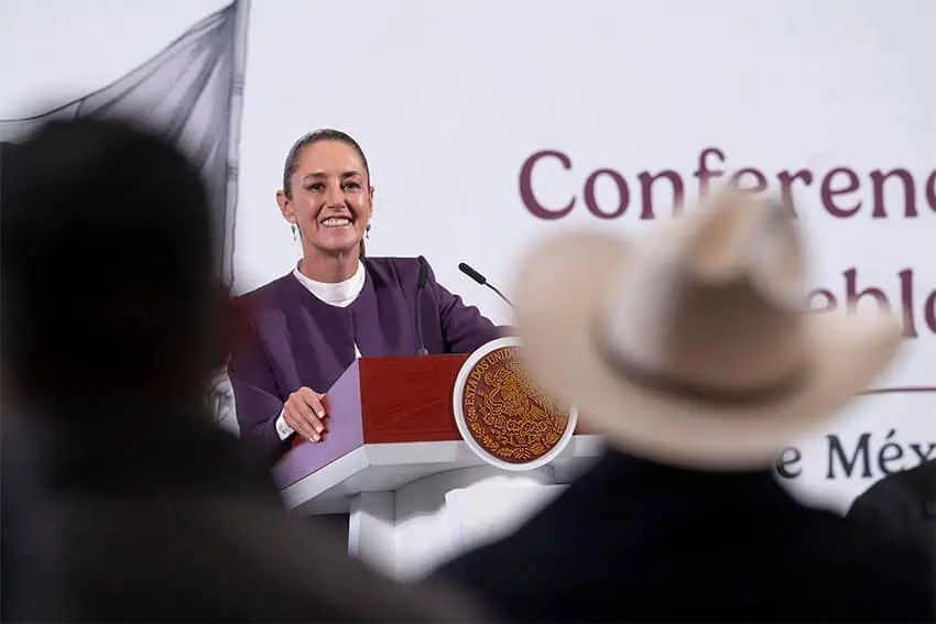 President Sheinbaum smiles at the audience at her morning press conference