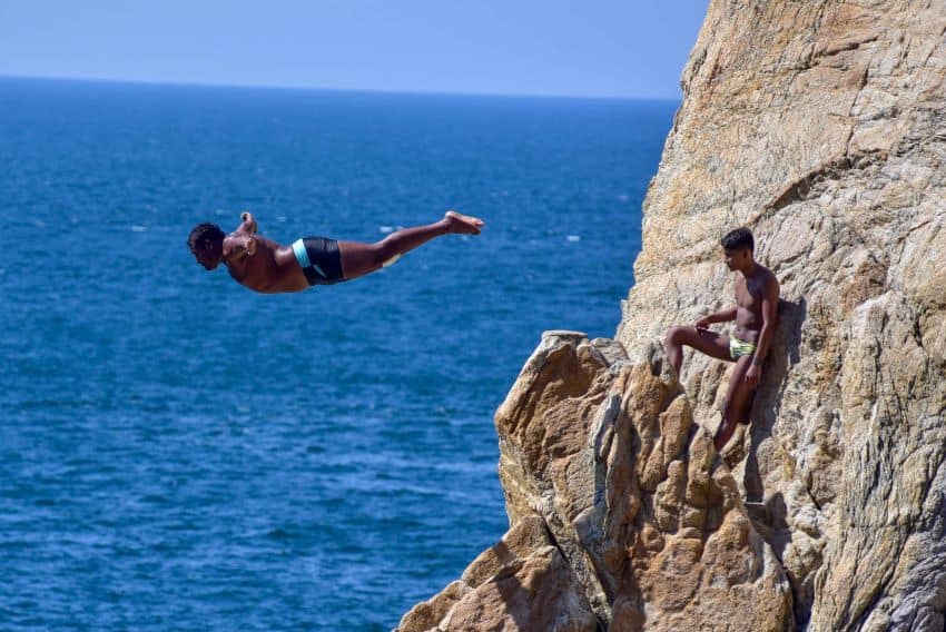 A diver jumps from La Quebrada cliffs in Acapulco