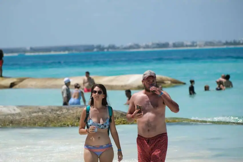 tourist couple on the beach in Mexico