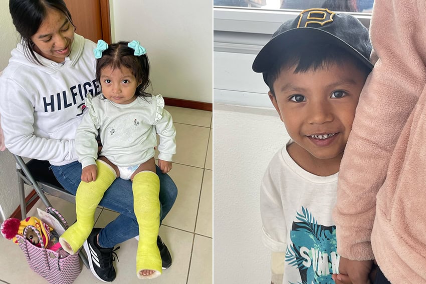Two children, patients of Kids First Orthopaedics, smile at the camera. One little girl has casts on both legs. The other, a little boy, hides behind his mother