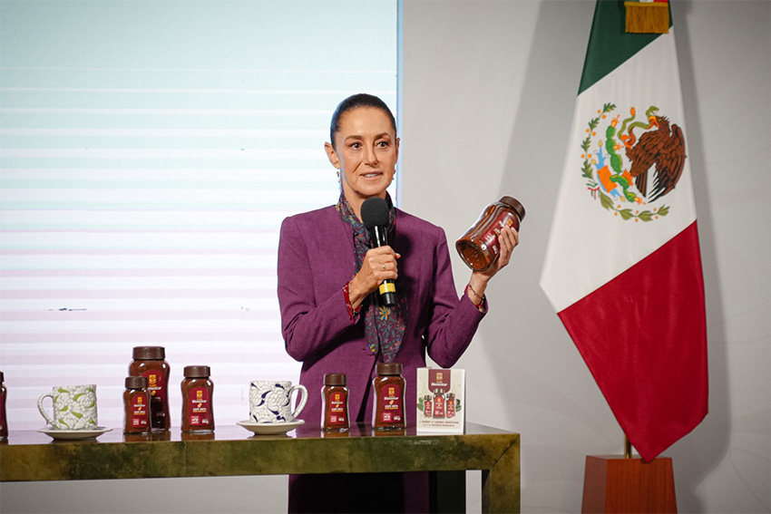 Sheinbaum holds a jar of Mexican government Wellness Coffee