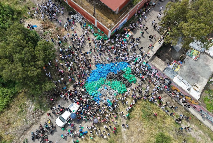 aerial view of blue trash bags in street