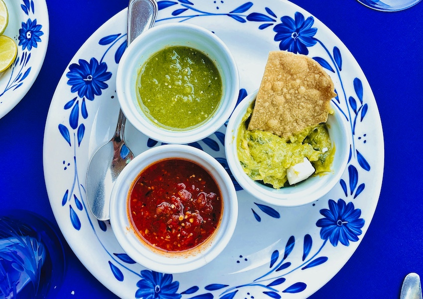 A plate with three different types of Mexican salsa