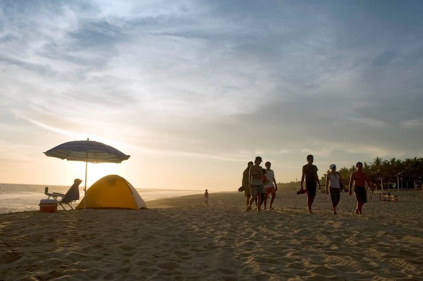 Turistas en la playa